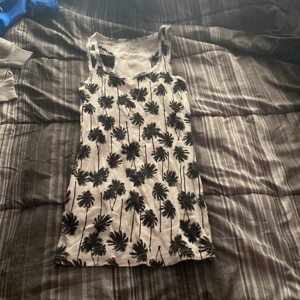 Women tank top size L with palm trees. Good shape
